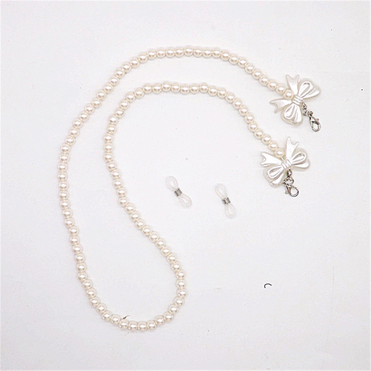 Elegante Perlen-Brillenkette mit Schleifenanhängern Brehn
