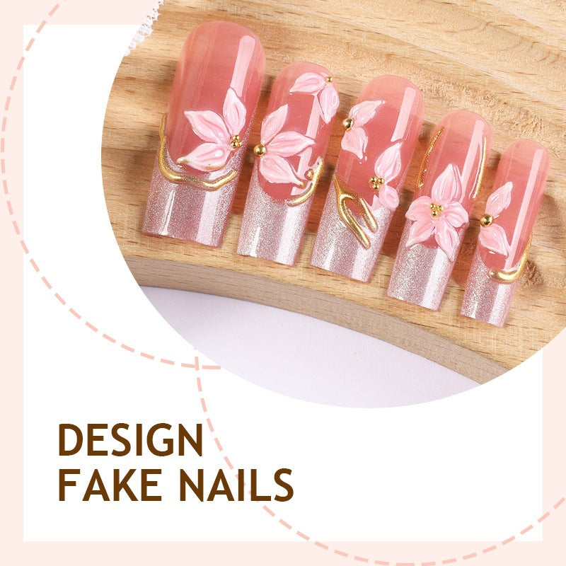 Elegantes Kunstnagelset mit floralen und Glitzerelementen Brehn