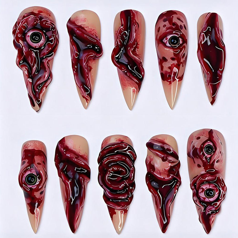 Kreatives Kunstnagelset mit gruseligem Design Brehn