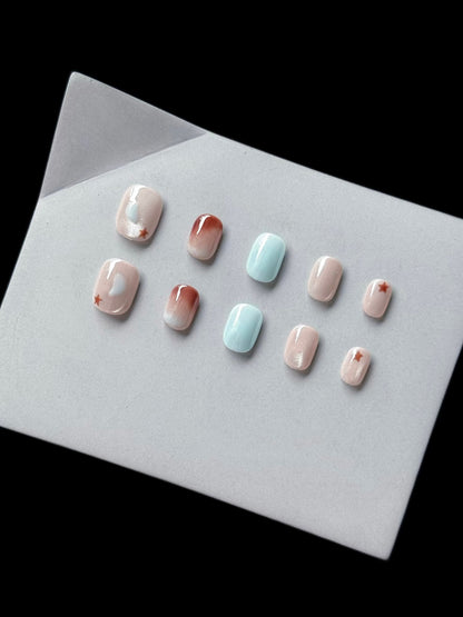 Künstlerisches Press-On Nagelset mit Stern- und Herzdesigns