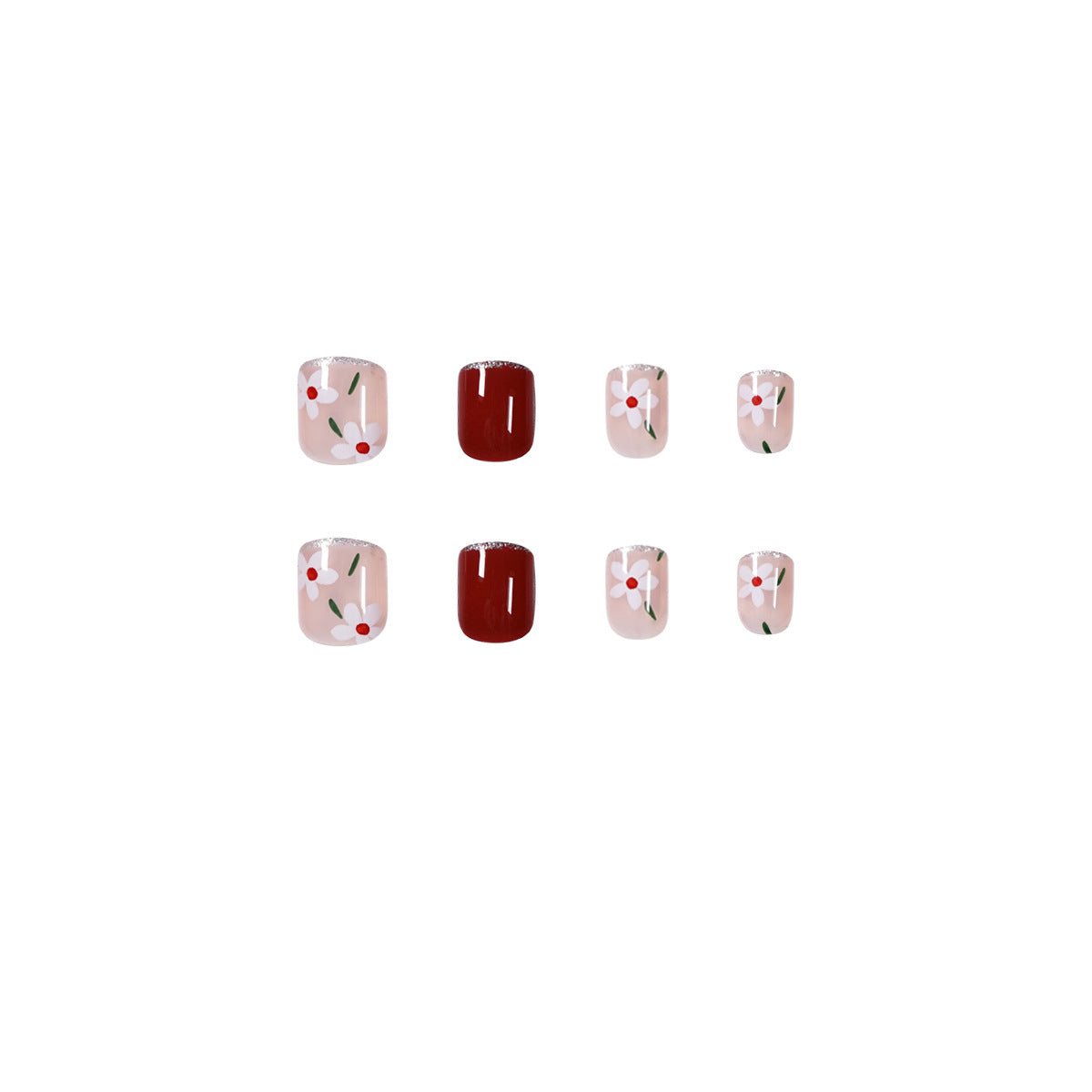 Kunstvolle Nagelkunst mit floralen Motiven und Glitzerakzenten Brehn
