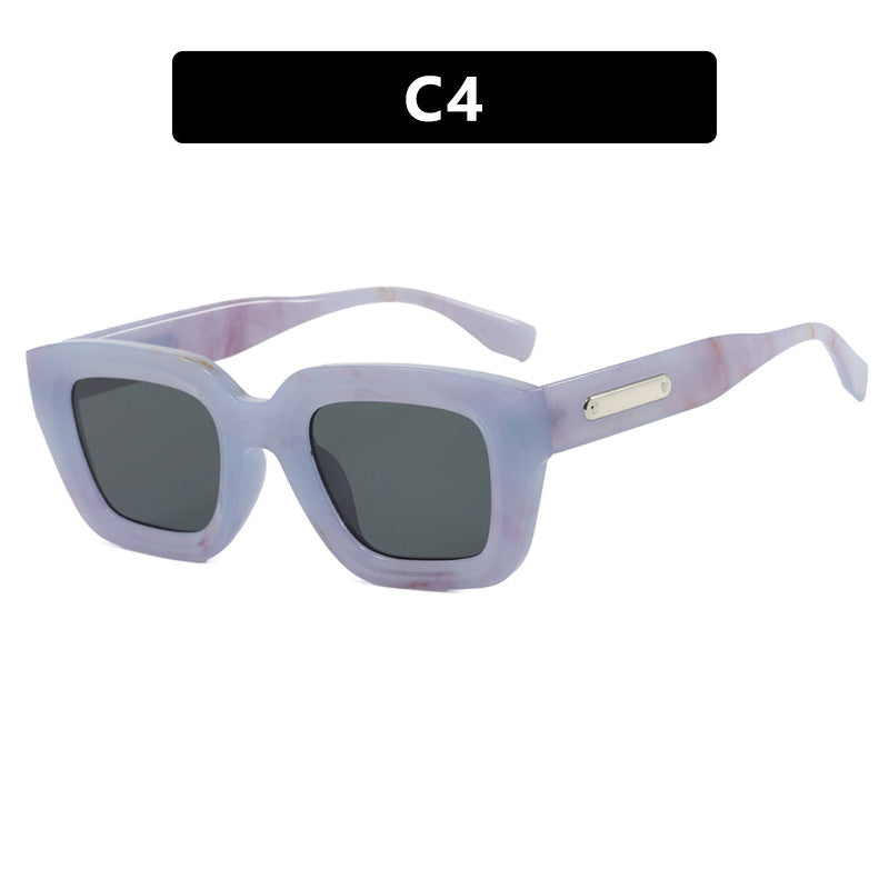Damen quadratische Sonnenbrille mit transparentem Rahmen und braunen Gläsern Brehn