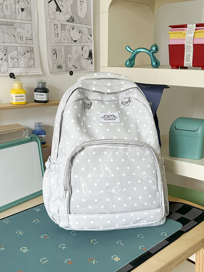 Lustiger gepunkteter Schulrucksack
