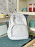 Lustiger gepunkteter Schulrucksack