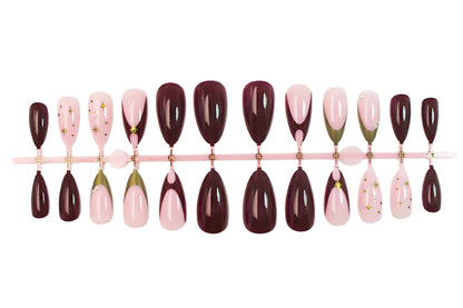 Kunstnagelset mit glamourösen Designelementen und eleganten Akzenten Brehn