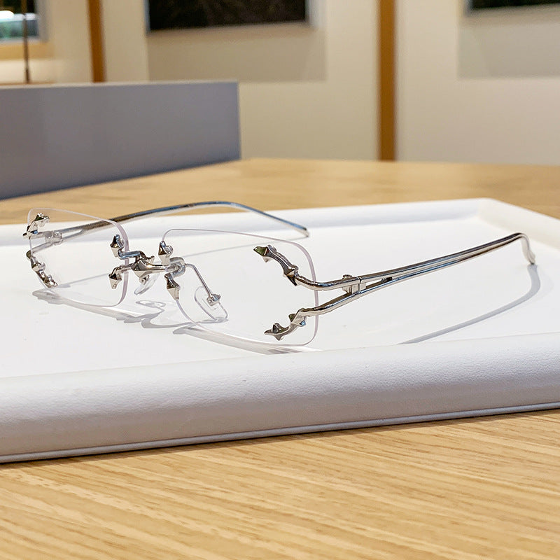 Damen modische Sonnenbrille mit filigranem Metallrahmen und transparenten Gläsern Brehn