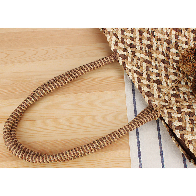 Modische Korbtasche mit Dekorativen Pompons Brehn