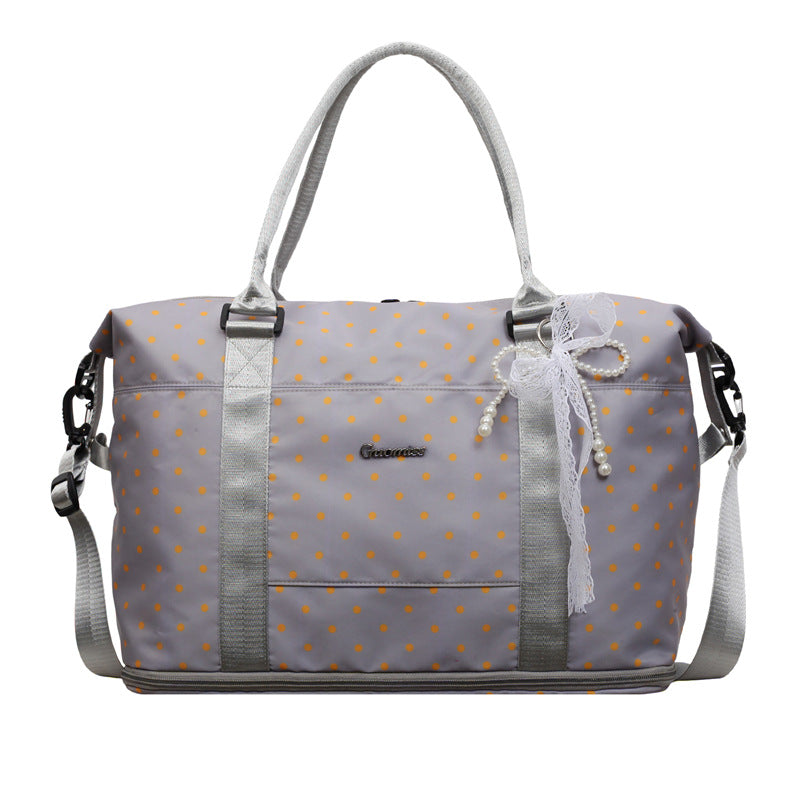 Stylische gepunktete Reisetasche