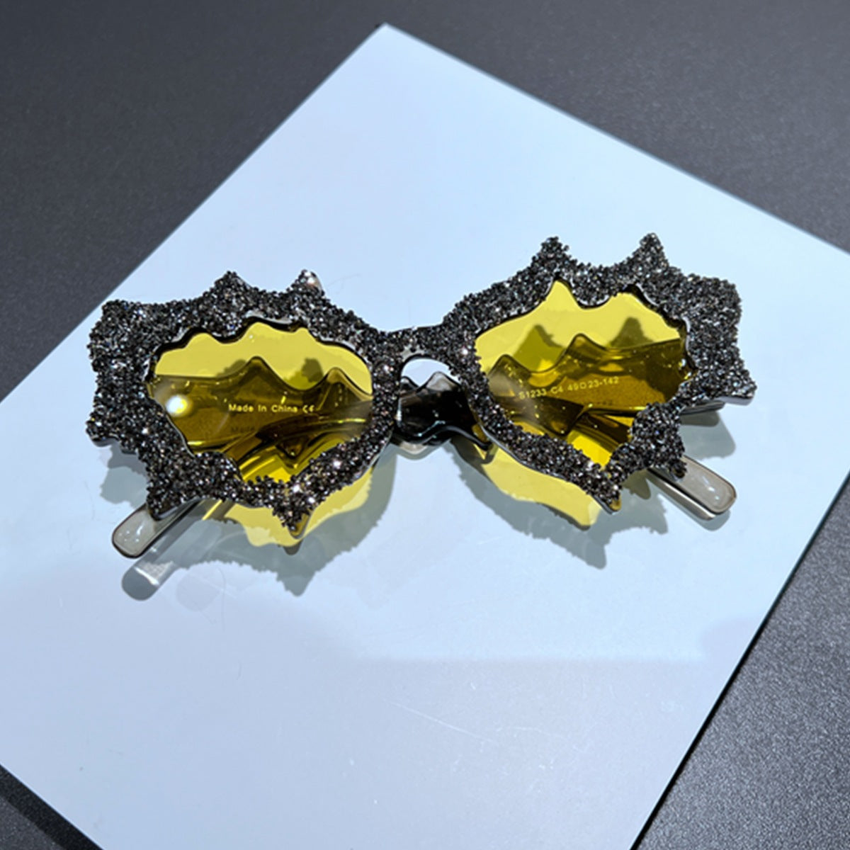 Damen kreative Sonnenbrille im extravaganten Design mit Glitzerverzierungen Brehn