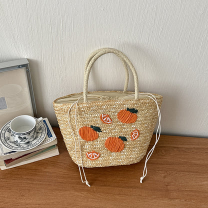 Bestickte Strohmärktasche