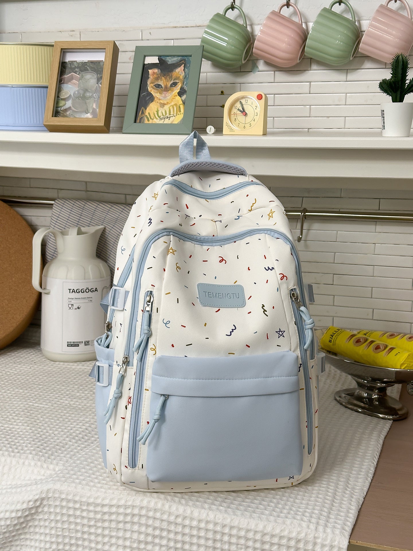 Vielseitiger gemusterter Schulrucksack