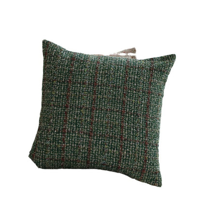 Quadratischer Bouclé-Kissenbezug im Tweedstil mit dezentem Multicolor‑Tufting Brehn