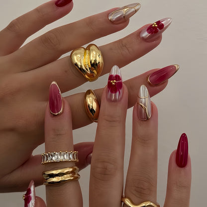Künstlerisches Press-On-Nagelset mit floralen Akzenten Brehn