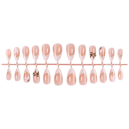 Elegantes Press-On Nail Art Set mit dekorativen Schleifenakzenten Brehn
