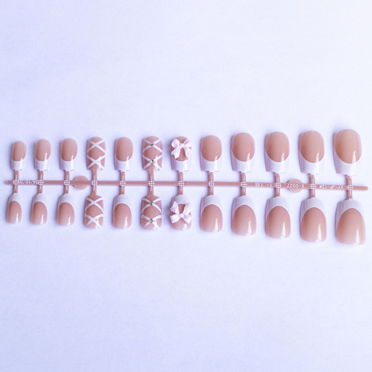 Dekorative französische Spitzen-Nagelkunst