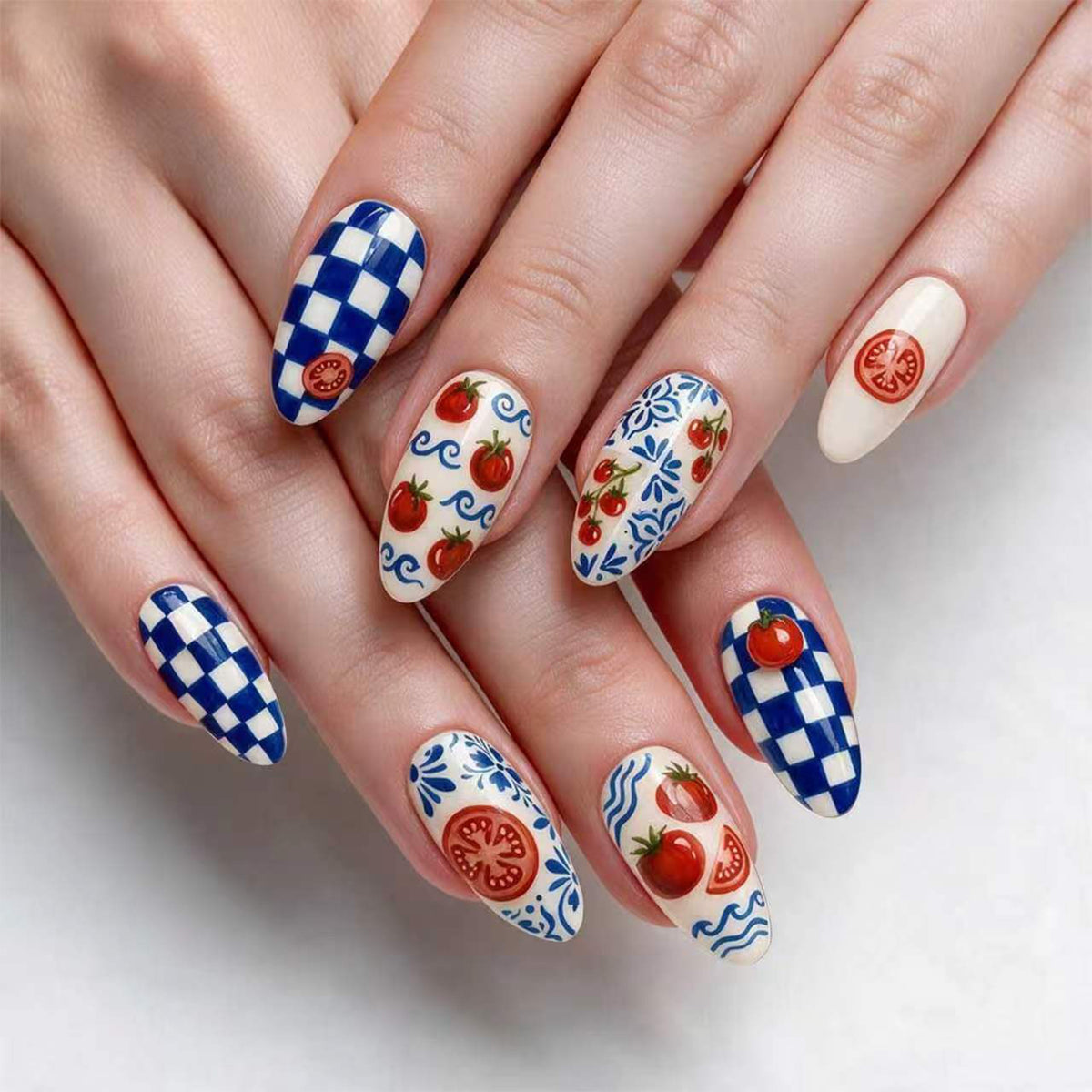 Kunstvolle Stiletto-Nägel mit fröhlichem Tomaten-Design Brehn