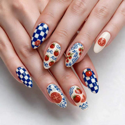 Kunstvolle Stiletto-Nägel mit fröhlichem Tomaten-Design Brehn
