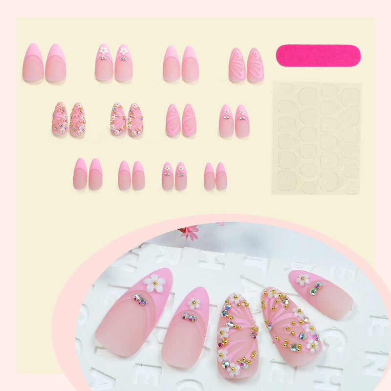 Dekoratives Press-On Nagelkunst-Set mit Schmuckstein- und Blumenakzenten Brehn