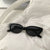 Stylische Katzenaugen-Sonnenbrille Brehn