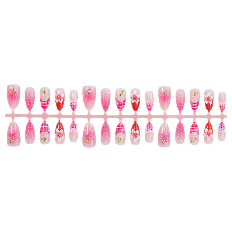 Kunstnagelset mit luxuriösen Glitzer- und Blütenakzenten Brehn
