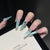 Glamouröse kristallverzierte Stiletto Press-On-Nagelerweiterungen Brehn