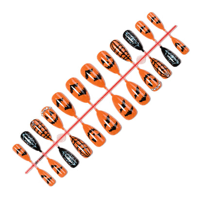 Kunstnagelset mit Halloween-Motiven und Glitzerelementen Brehn