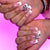 Kunstnagelset mit luxuriösen French-Spitzen und eleganten Verzierungen Brehn