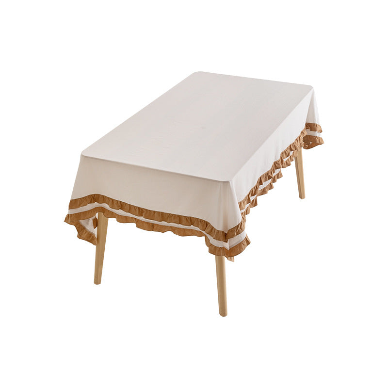 Rundtischdecke mit gestepptem Strukturrelief und zweilagigem Volant Brehn