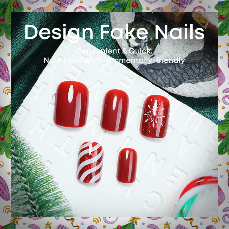 Kunstnagelset mit festlichen Designs und Glitzerakzenten Brehn