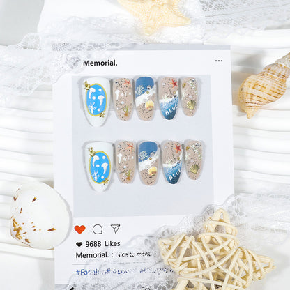 Kunstnagelset mit maritimen Designs und eleganten Verzierungen Brehn