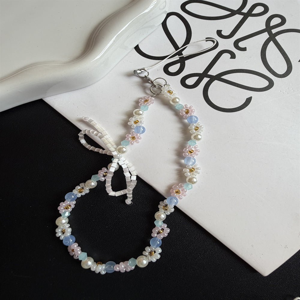 Blumiger Perlenbrillenhalter Brehn