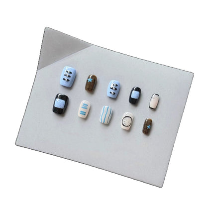 Künstlerisches Press-On Nagelkunst Set mit modernen geometrischen Mustern