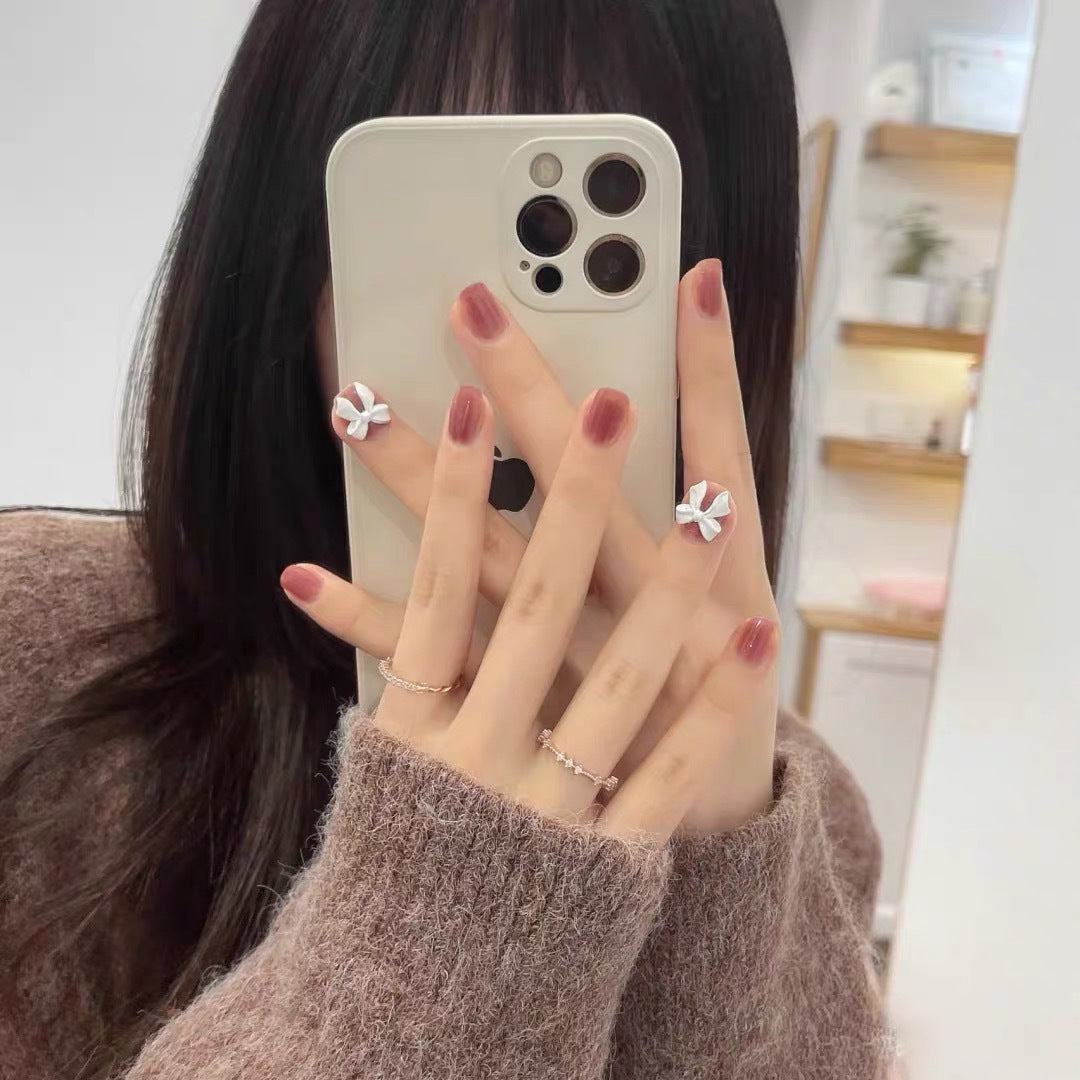 Kunstnägel mit eleganten Schleifenmotiven Brehn