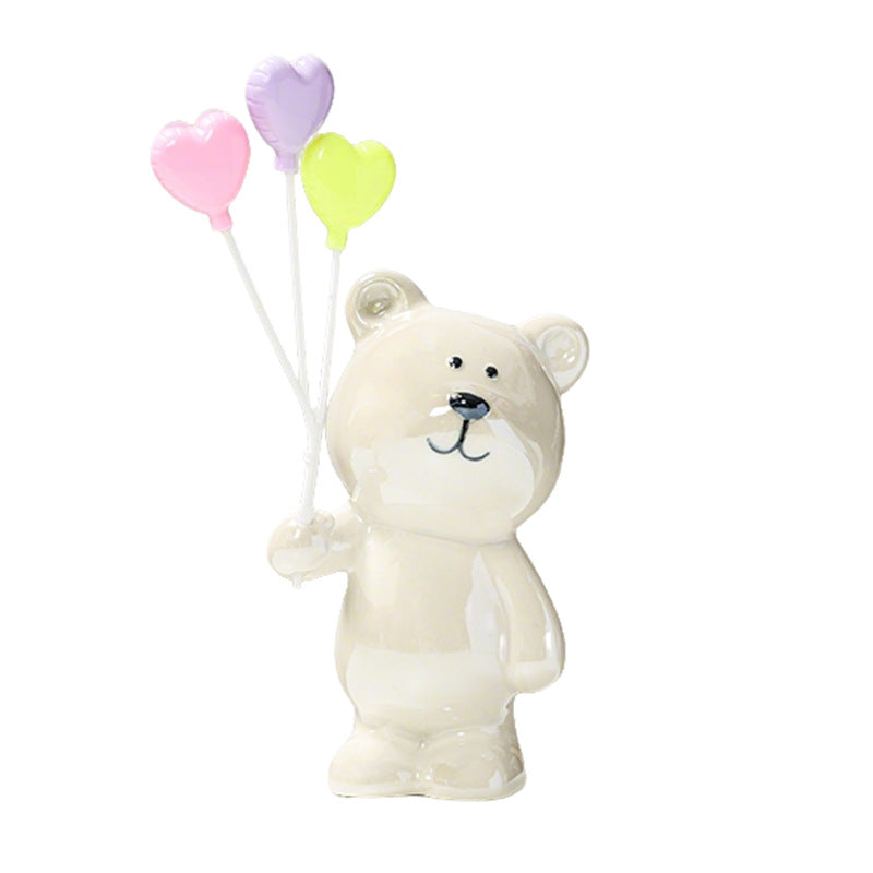 Süße Keramikbärenfigur mit Luftballons Brehn