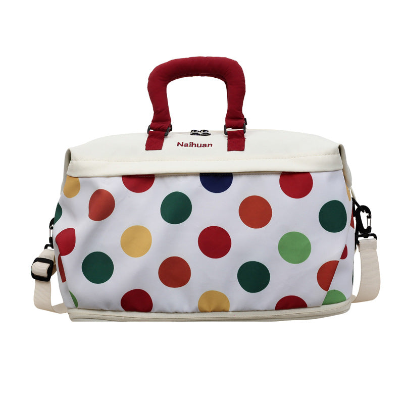 Bunte gepunktete Reisetasche