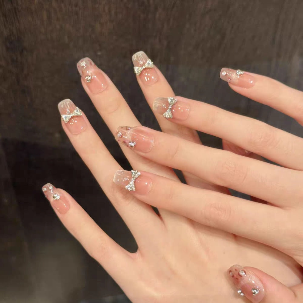 Dekoratives Strass-Bow Press-On Nagelset Brehn