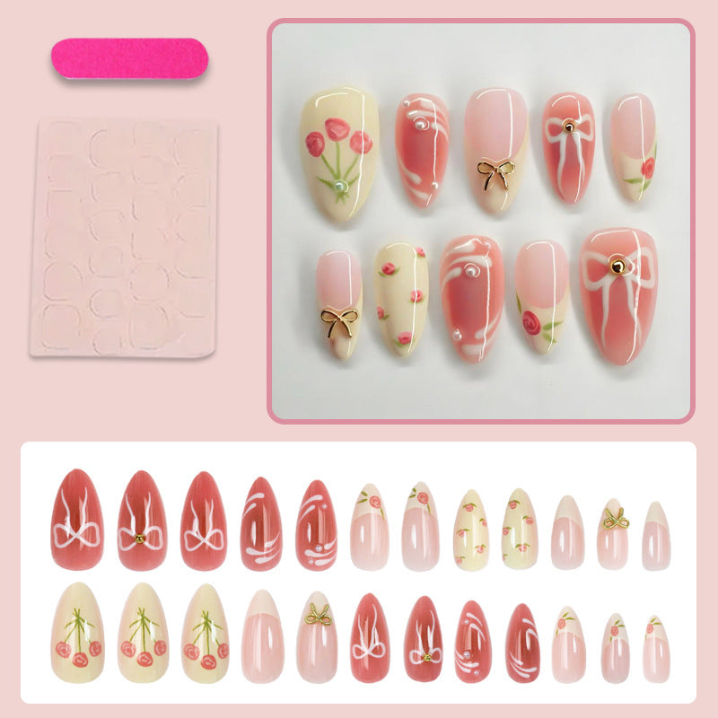 Kunstnagelset mit floralen Akzenten und elegantem Glitzer Brehn