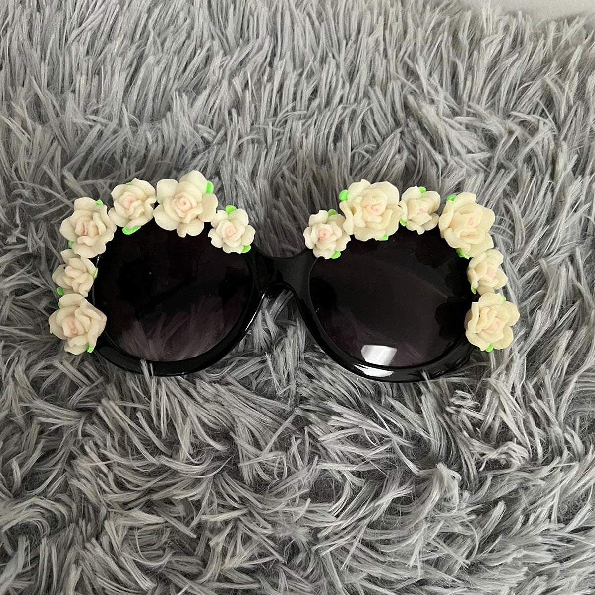 Damen Sonnenbrille mit floralen Akzenten Brehn