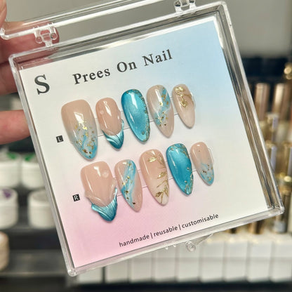 Anpassbares Press-On-Nagel-Kunst-Set mit eleganten floralen und ozeanischen Designs