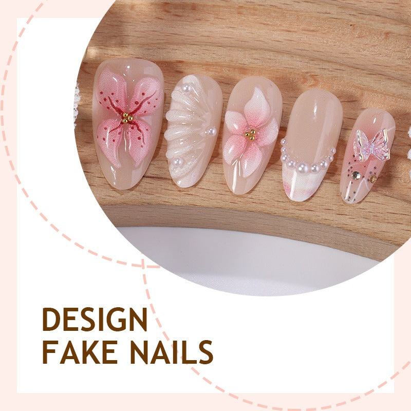 Kreatives Kunstnagelset mit filigranen Blüten- und Glitzerverzierungen Brehn