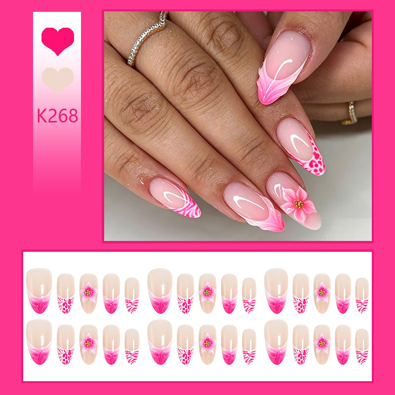 Kunstnagel-Set mit floralem Design und Glitzerdetails Brehn