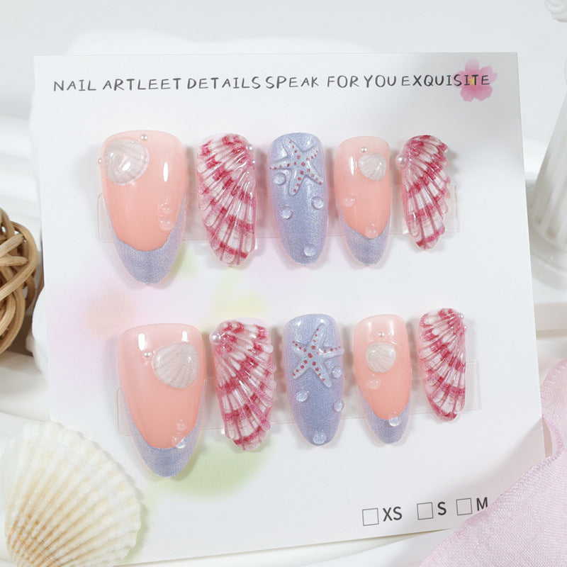 Kunstnagelset mit maritimen Muschel- und Sternenmotiven Brehn