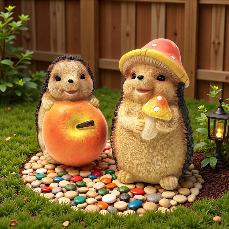 Niedliche Igel Skulptur mit Obst Brehn