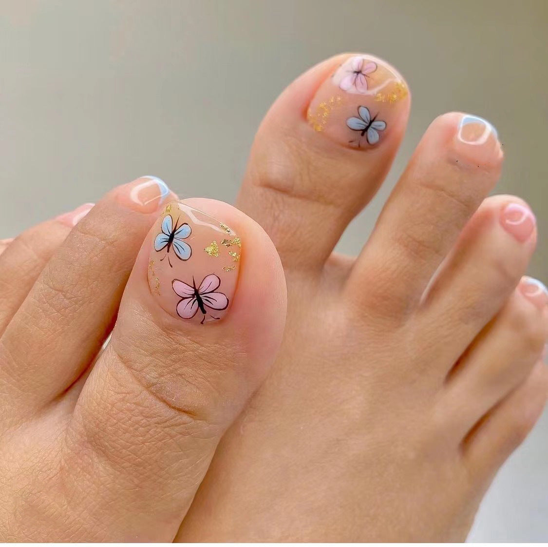 Kunstvolle Fußnagelgestaltung mit Göttlichem Schmetterlingsdesign Brehn