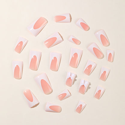 Elegante Stiletto-Nagelkunstverlängerungen mit Schleifenakzenten Brehn