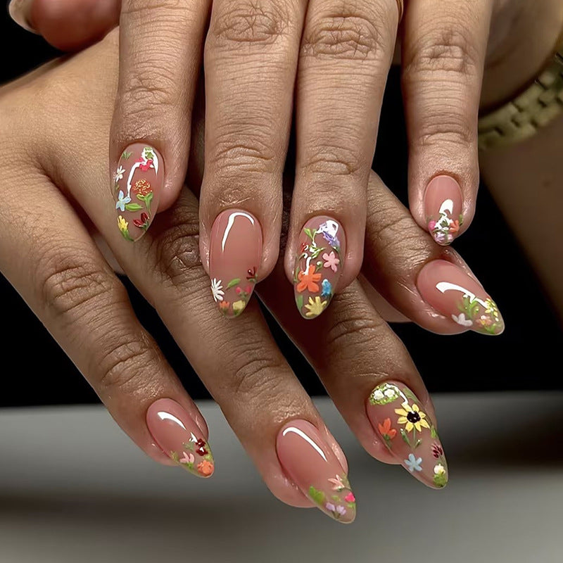 Kunstnagelset mit floralen Designs und elegantem Glanz Brehn