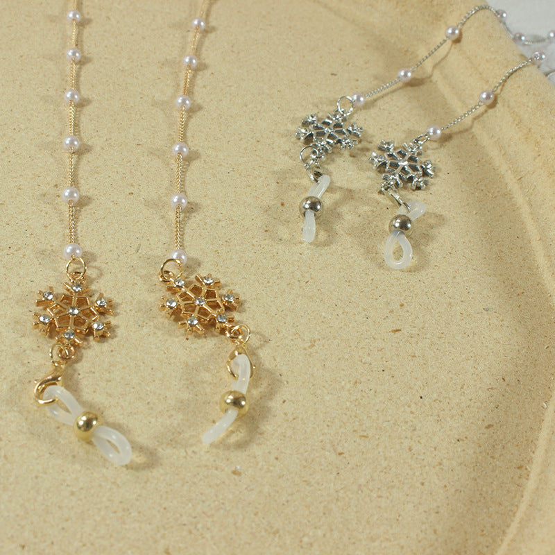 Elegante Brillenhalterkette mit Perlen und Schneeflockenanhänger Brehn