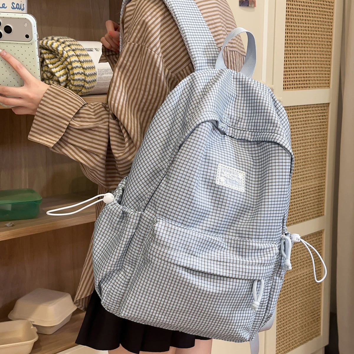 Stylischer gittergemusterter Tagesrucksack Brehn