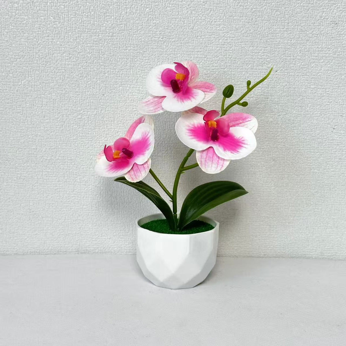 Künstliche Orchideenarrangement für dekorative Innendekoration