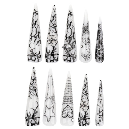 Kunstvolle Stiletto-Nägel mit Gothic-Muster und Verzierungen Brehn